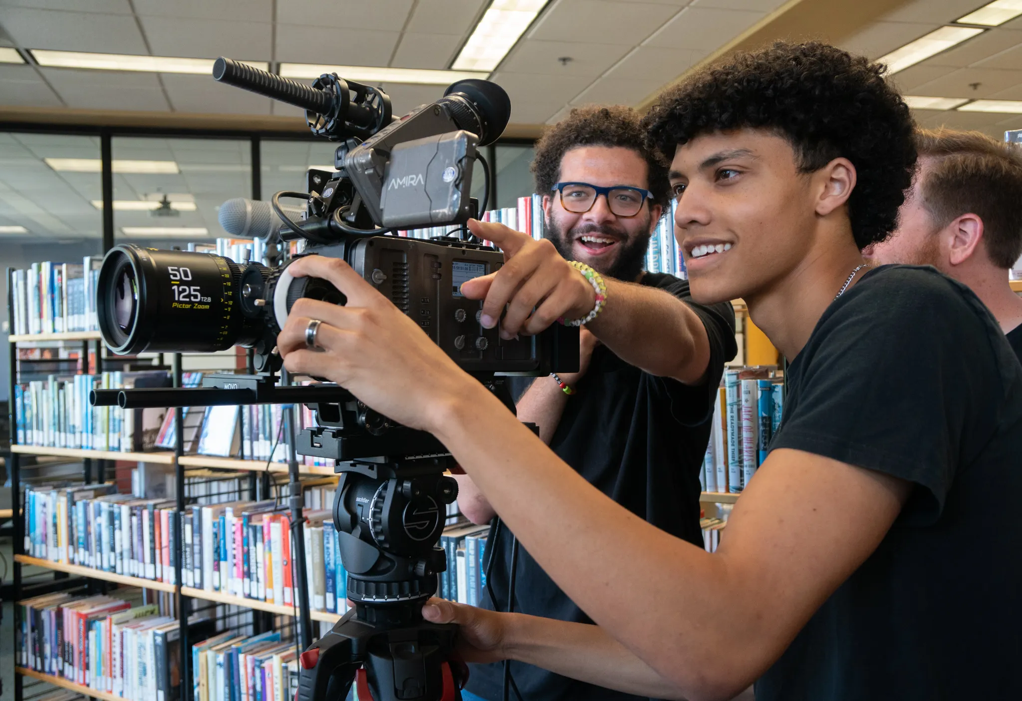 Film students working with camera