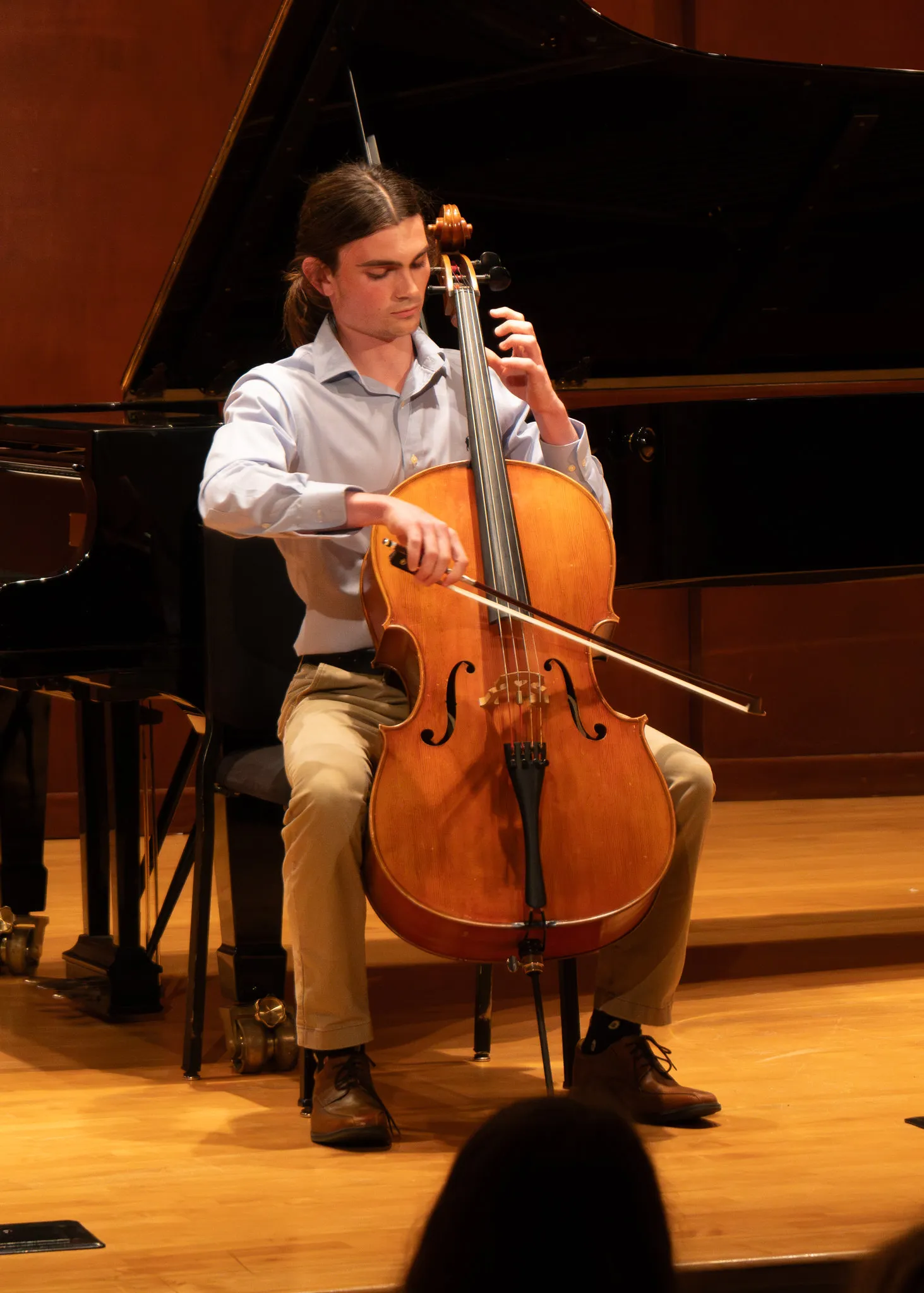Student playing the cello